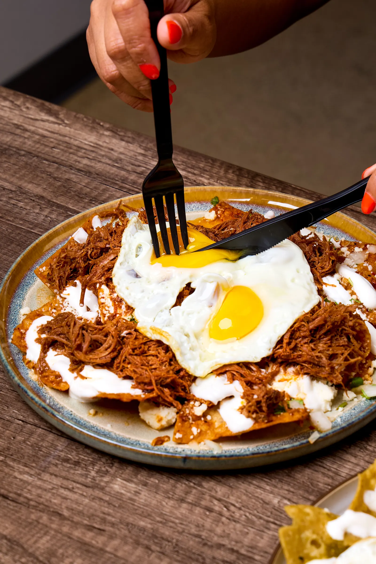 Chilaquiles rojos with eggs — breakfast at Mr. Birria
